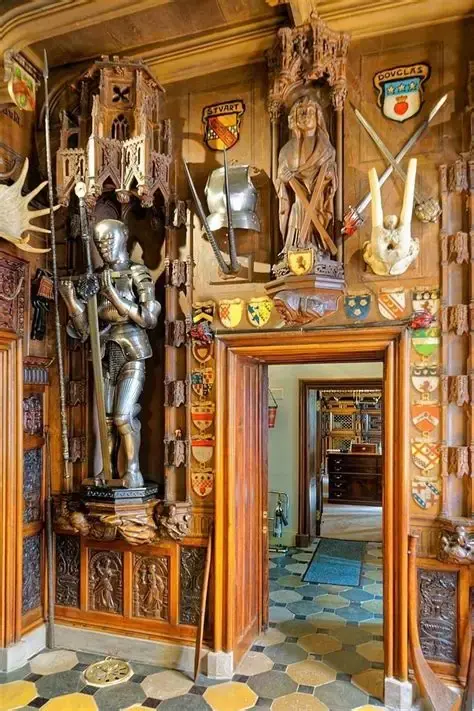 The armory hall at Abbotsford, lined with historic weapons and heraldry